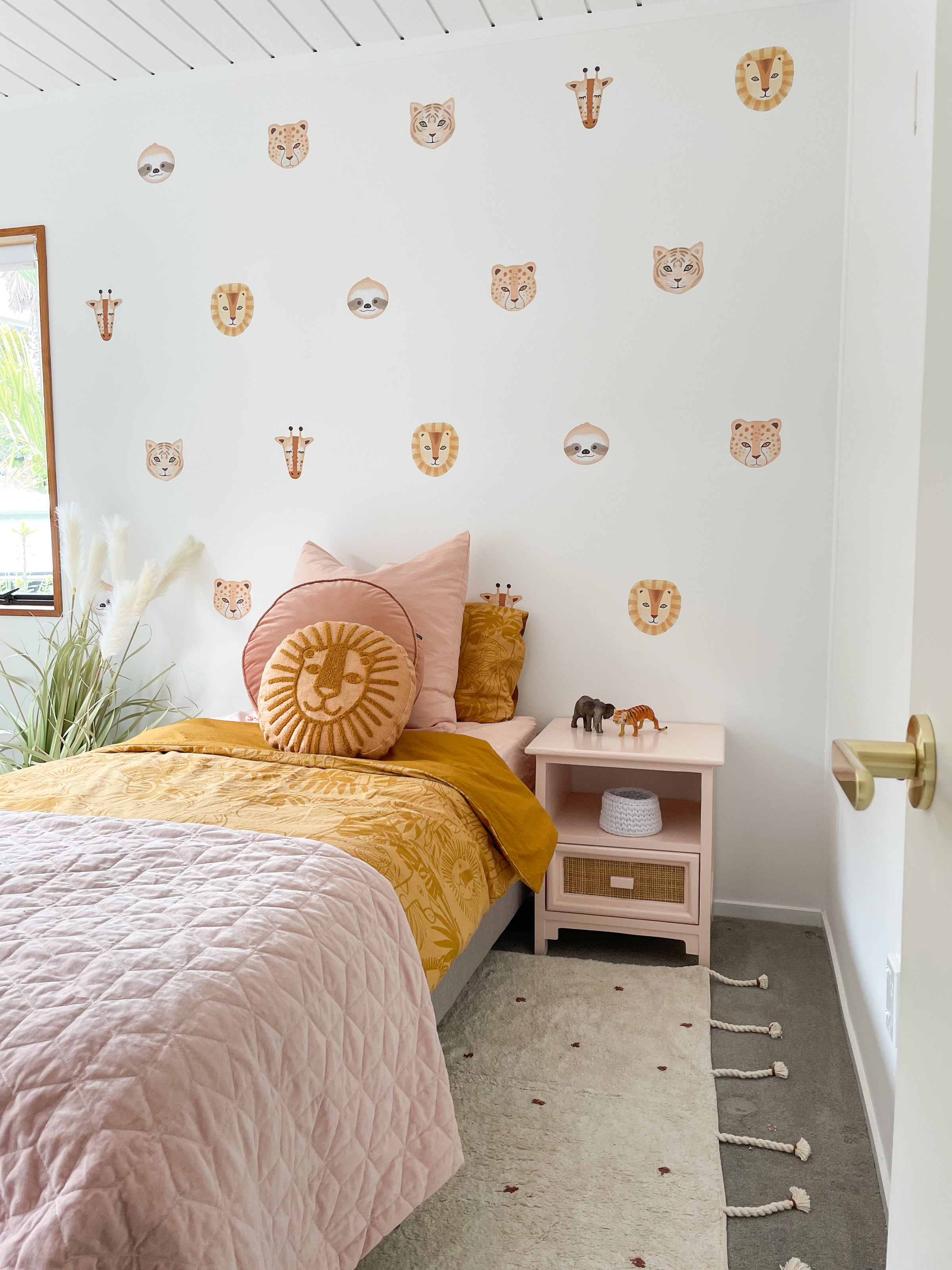 Girls bedroom with animal wall decals