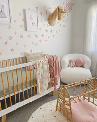 Flower petal wall stickers in girls nursery